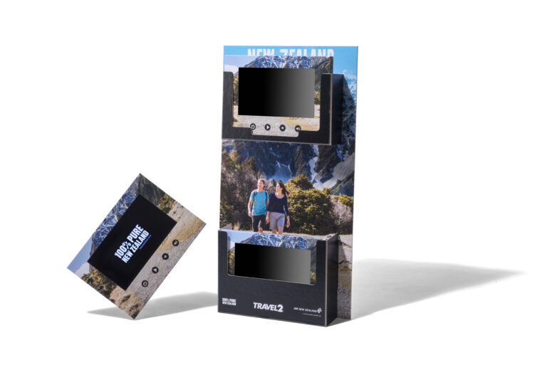 Photo of New Zealand video brochure point of sale. Interactive travel brochures are the perfect way to elevate your travel brand and give customers a multisensory delight. Click to find out more about video brochures over on the Clone Media.