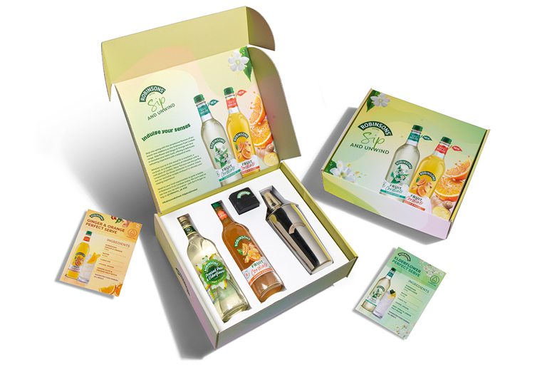 Image: Robinsons new cordials influencer packaging boxes. Open box showing bottles with new flavours in eco packaging.